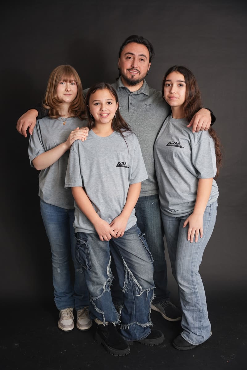 Cris Blanco and his family, in ARM Premium Painting shirts