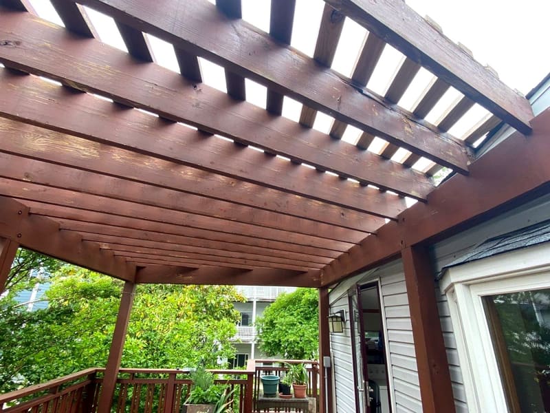 Pergola and deck by ARM Premium Painting — Structure and decking stained to match