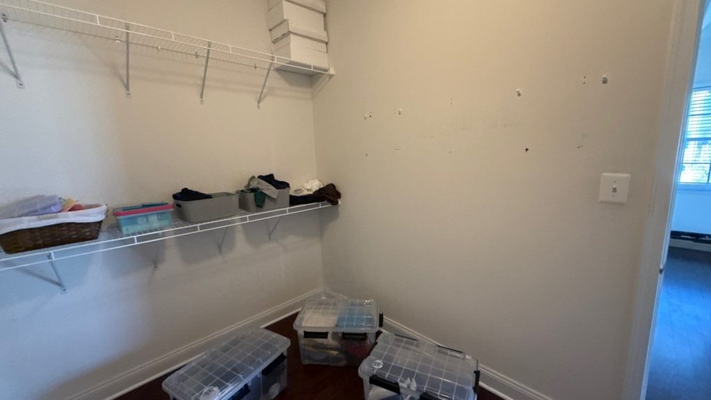 Before interior painting in Upper Marlboro, MD - patched closet wall with nail holes
