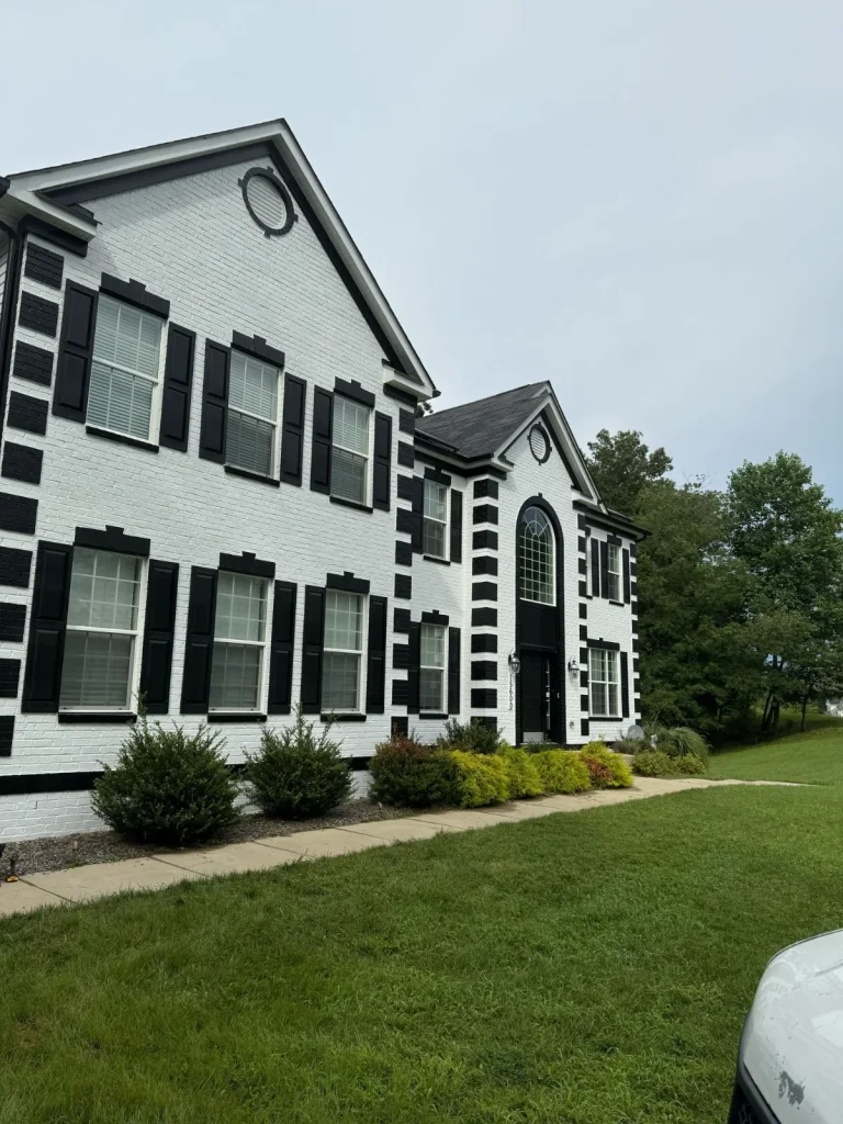 ARM Premium Painting crew working on an exterior painting project