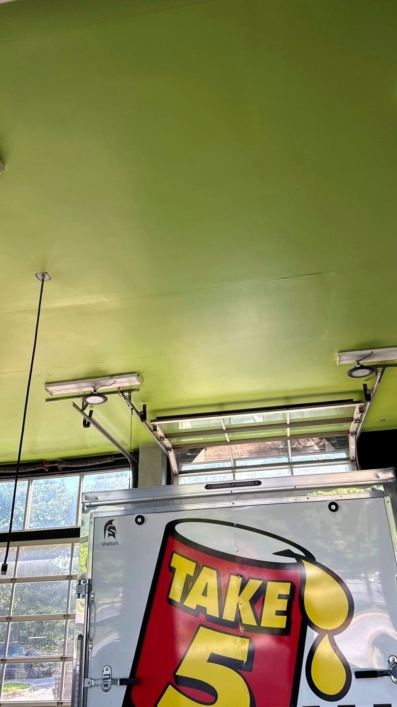 Repainted interior walls and ceiling in a commercial unit